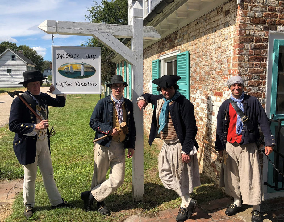 https://mobjackbaycoffee.com/cdn/shop/files/Reenactors_in_front_by_sign_460x@2x.jpg?v=1644089475